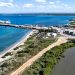 Empresarios que pretende despojar Playa a comunidad buscan control de la industria portuaria y manejo de carga de Puerto Manzanillo